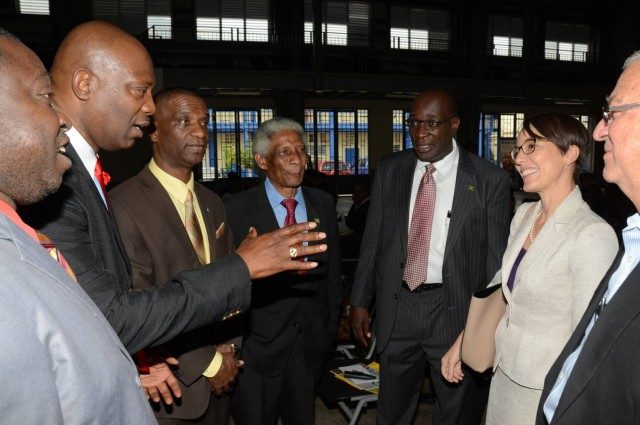 Foreign Affairs and Foreign Trade Minister, Senator the Hon. Kamina Johnson Smith (second right), having a light exchange with Chairperson of the Jamaica Diaspora Education Task Force, Leo Gilling (second left), on the first of the two-day 2nd Biennial Advancement in Education Summit at Jamaica College, on Old Hope Road in Kingston, on March 23. Others (from left) are: President of the Jamaica Teachers’ Association (JTA), Norman Allen; President of the Mico University College, Dr. Ashburn Pinnock; Executive Director of the Jamaica Diaspora Institute, Professor Neville Ying; Education, Youth and Information Minister, Senator the Hon. Ruel Reid and Opposition Spokesperson on Education and Training, Rev. Ronald Thwaites.